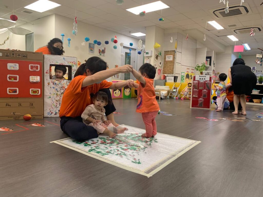 Infant care in Singapore: Using art to help babies develop language skills